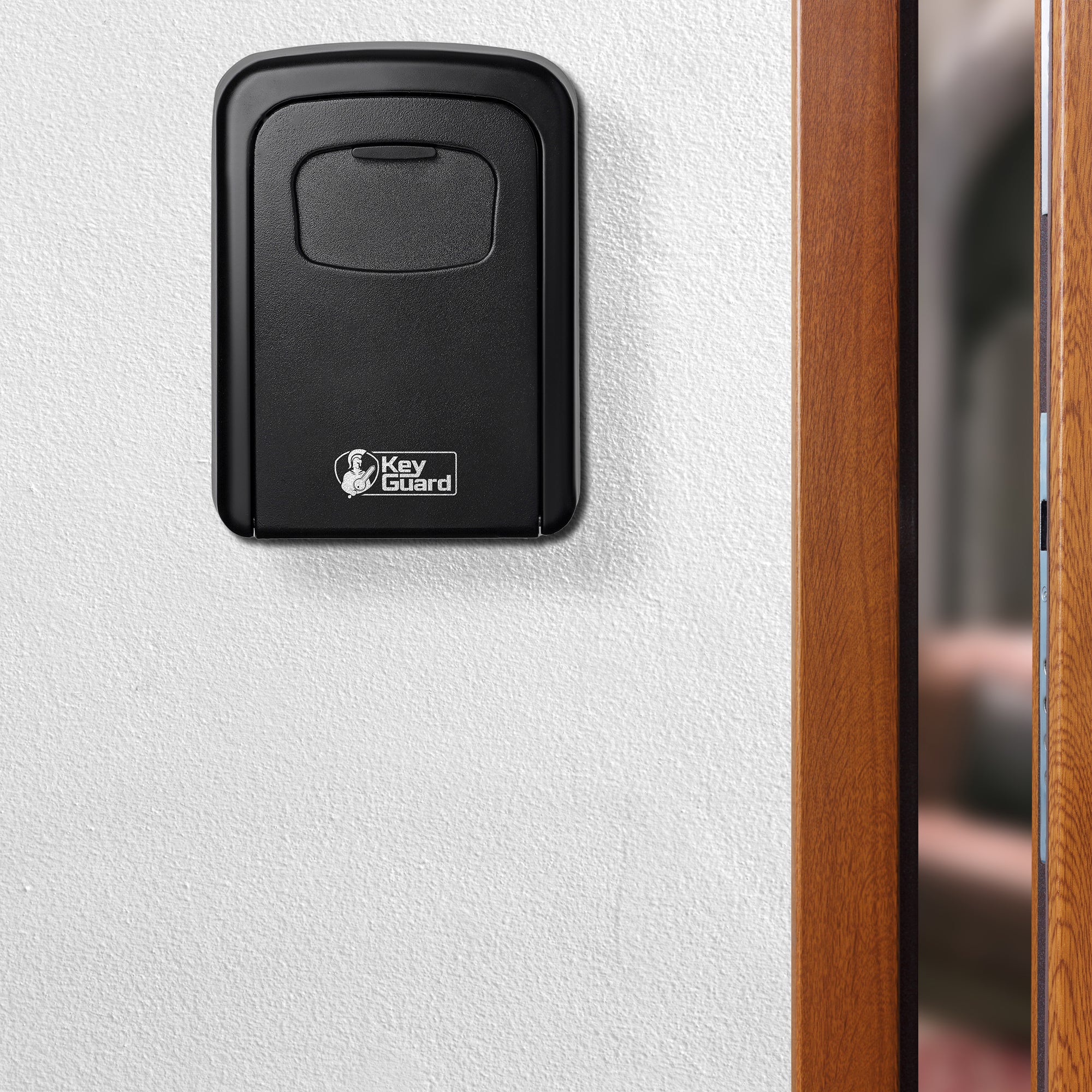 Sleutelkluisje Pro van KeyGuard bevestigd aan de muur.